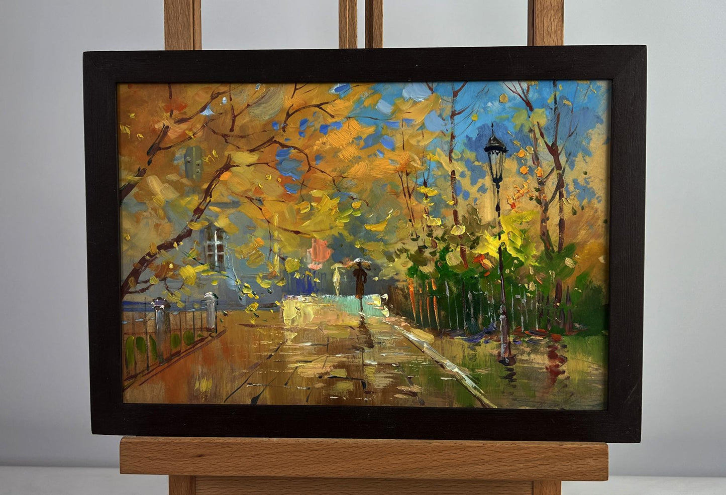 Framed impressionistic oil painting Autumn leaves are flying by Yuriy Suprunchuk