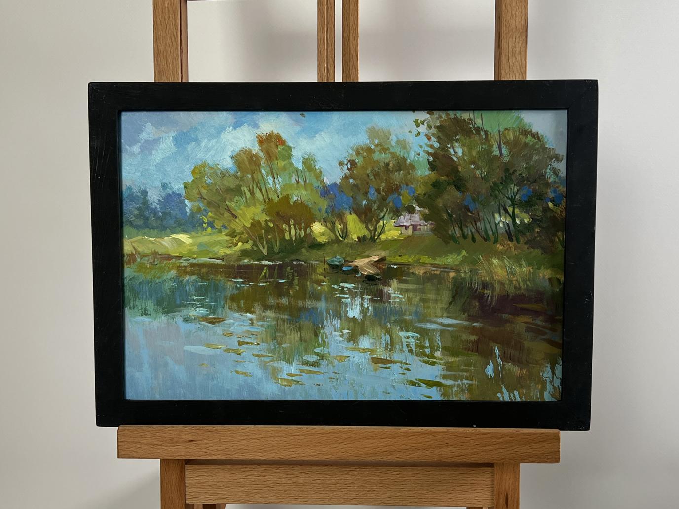 Framed oil painting of quiet ferryman in village by Yuriy Suprunchuk