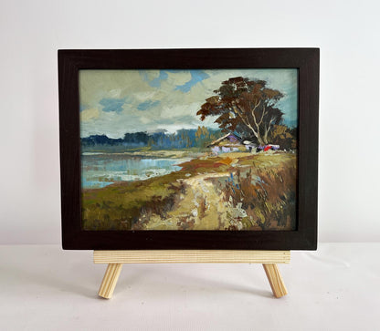 Framed oil painting of autumn forest house by Yuriy Suprunchuk