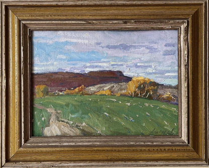 Rustic oil painting by Oleksandr Andreev of green field landscape