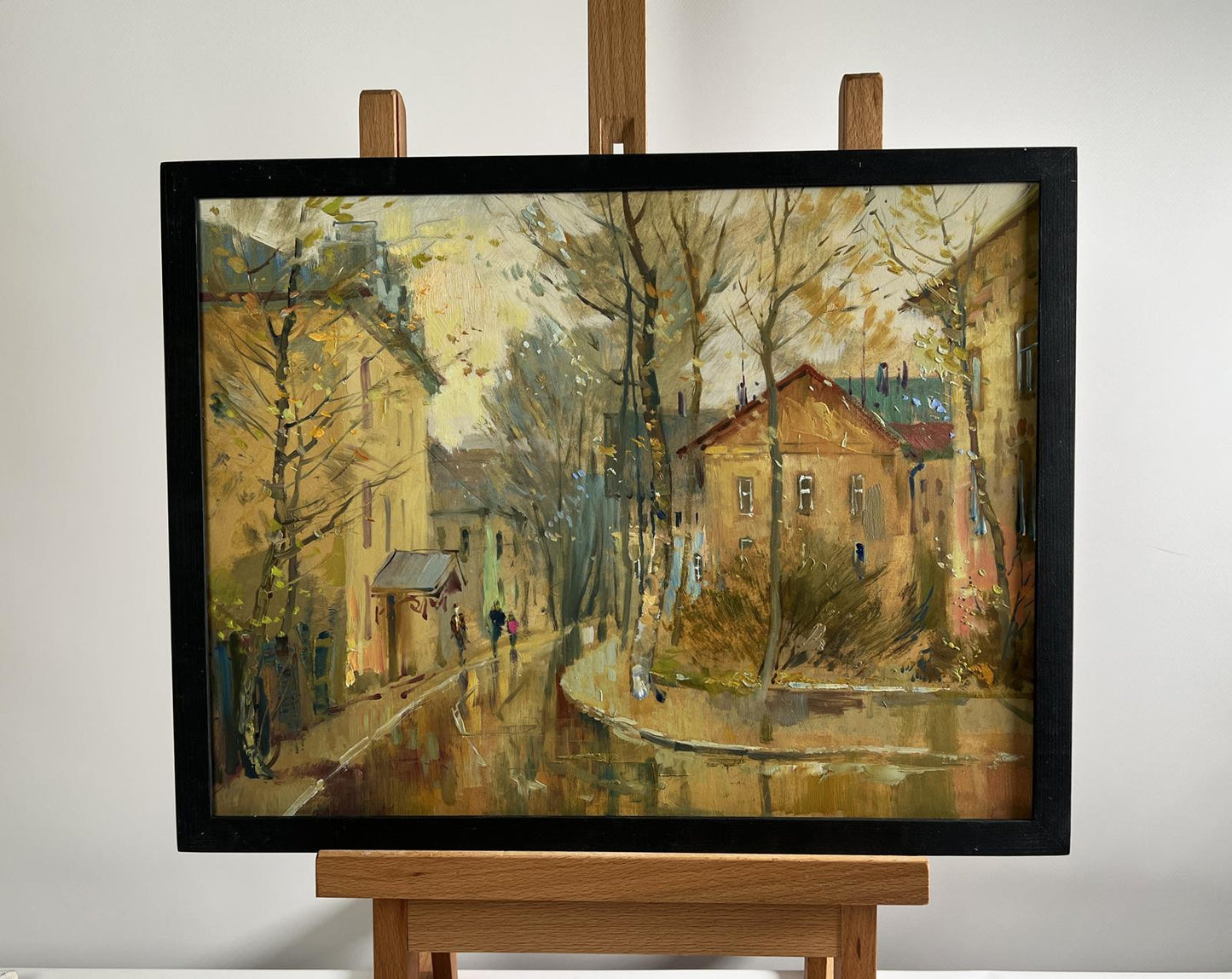 Framed oil painting Reflections of Autumn by Yuriy Suprunchuk, rainy street scene
