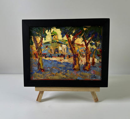 Oil painting Evening Sound of the Bell by Oksana Ivanyuk in black frame