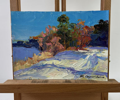 Oil painting Snow under the sun by Boris Serdyuk on wooden easel
