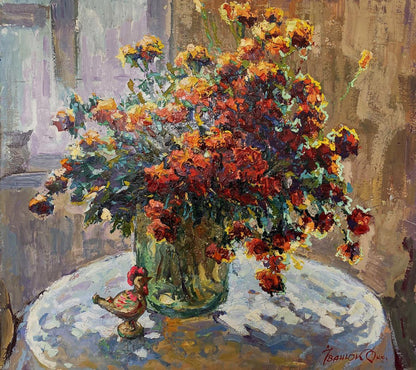Oil painting of vibrant orange red marigolds by Oksana Ivanyuk in green vase