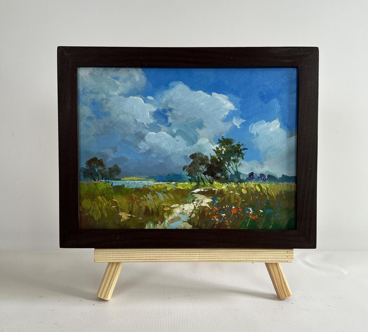 Oil painting In the flower field by Yuriy Suprunchuk in dark wooden frame