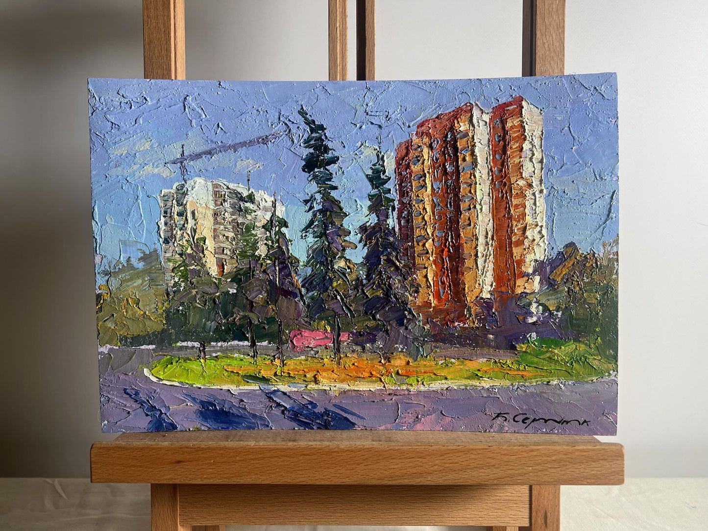 Oil painting Summer city park by Boris Serdyuk on wooden easel