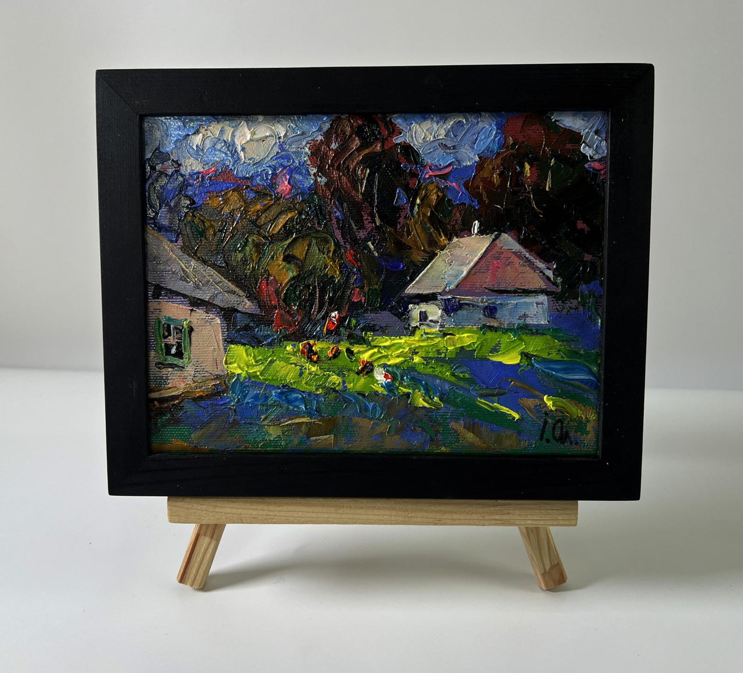 Oil painting Village life in silence by Oleksiy Ivanyuk in black frame