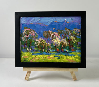 Oil painting Spring in the village by Oleksiy Ivanyuk in black frame