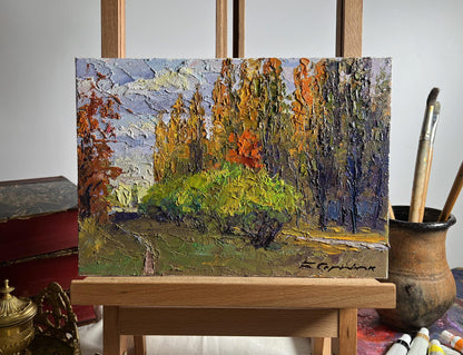 Oil painting of autumn city park by Boris Serdyuk with vibrant foliage