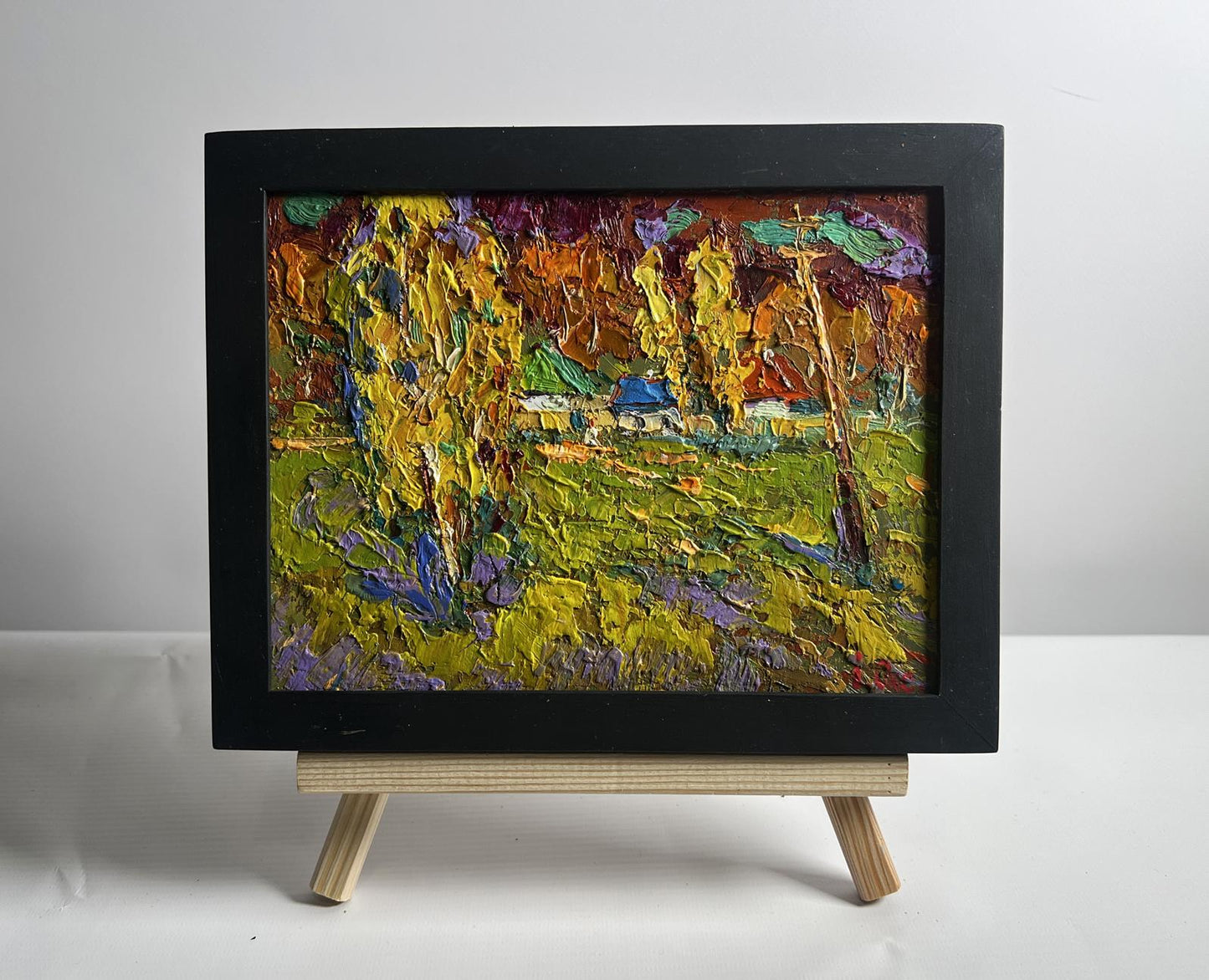 Oil painting Autumn streets of village by Oksana Ivanyuk in black frame