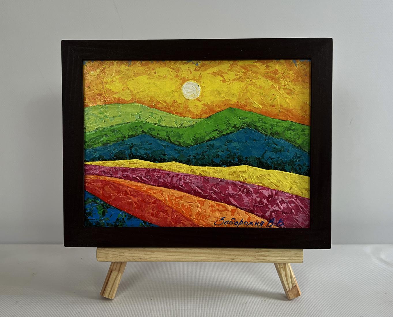 Oil painting of flower meadow silhouettes by V. Zadorozhnya in black frame