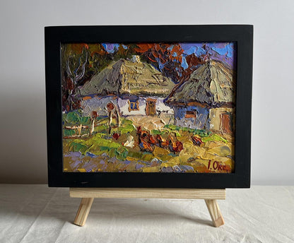 Oil painting of chickens in yard by Oksana Ivanyuk in black frame