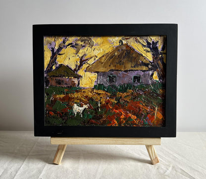 Vibrant Oleksiy Ivanyuk oil painting of yellow sunset behind thatched houses