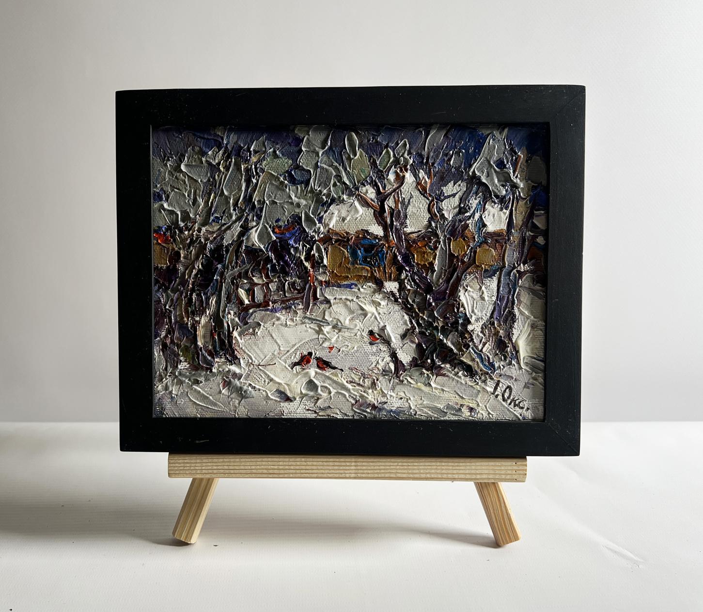 Oil painting Bullfinch in snowy yard by Oksana Ivanyuk in black frame