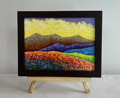 Oil painting Observing a natural phenomenon by V. Zadorozhnya, vibrant mountains under yellow sky