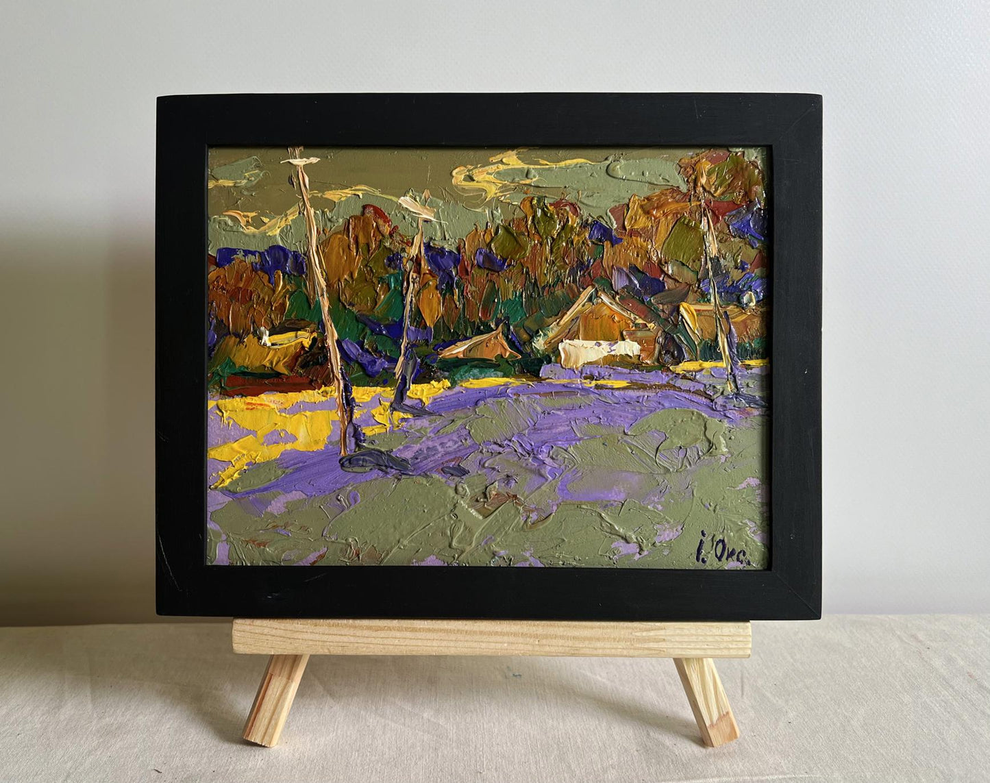 Oil painting Overlooking the Village by Oksana Ivanyuk in black frame