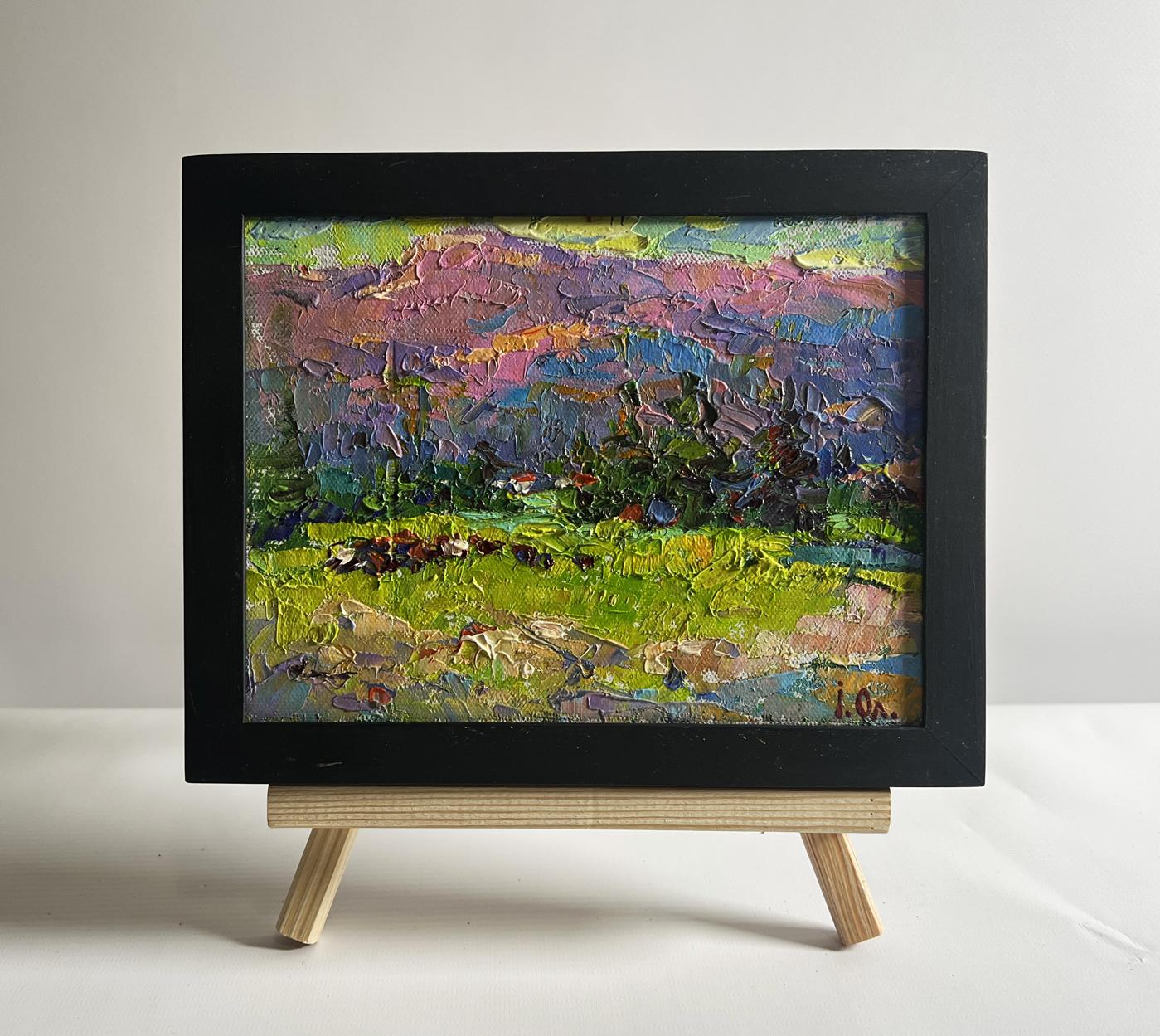 Oil painting of pink purple green mountains by Oleksiy Ivanyuk in black frame