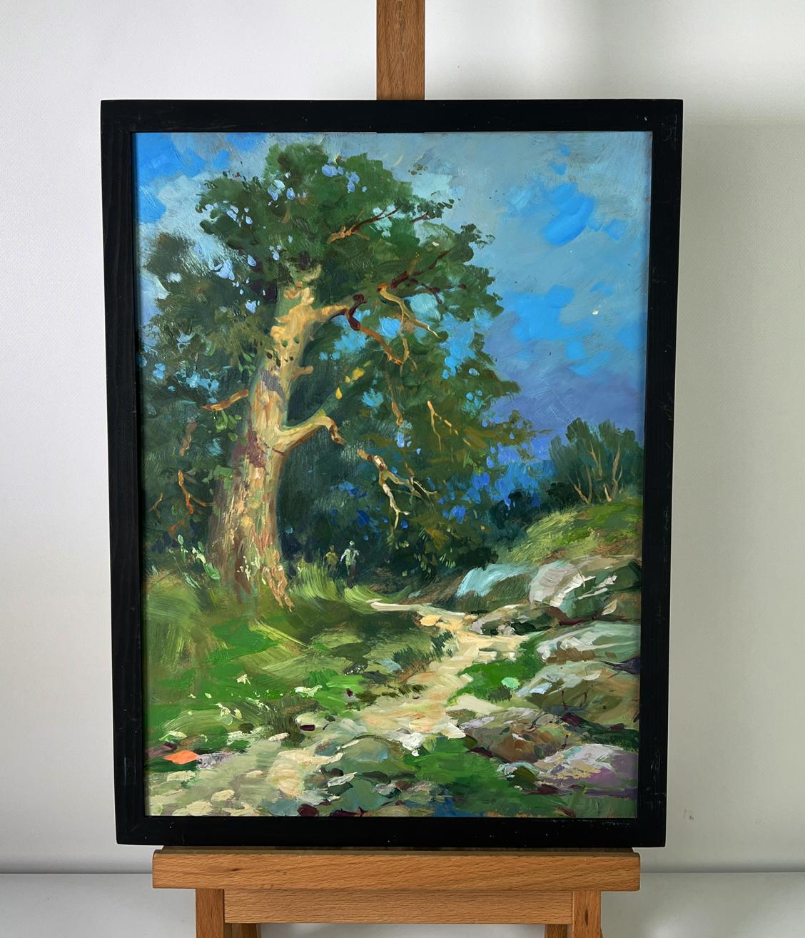 Oil painting of daytime road into forest by Yuriy Suprunchuk on easel