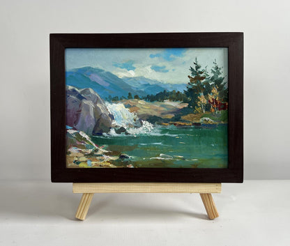 Framed oil painting of waterfall in mountains by Yuriy Suprunchuk