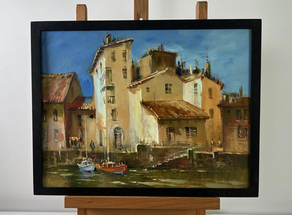 Oil painting Streets of Venice by Yuriy Suprunchuk in black frame on easel