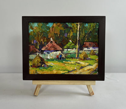 Impressionist oil painting by Oleksiy Ivanyuk of village bench scene in wooden frame