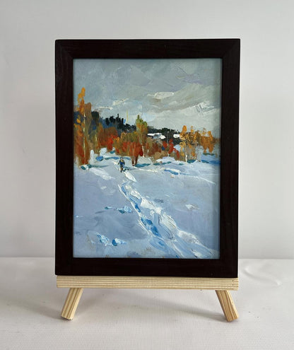 Oil painting Walking in the winter forest by Yuriy Suprunchuk in dark frame