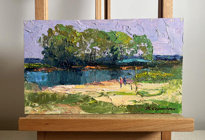 Oil painting On the golden shore by Boris Serdyuk with green trees and blue pond