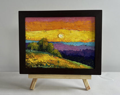 Vibrant impressionist oil painting of sunset over hills by V. Zadorozhnya in black frame