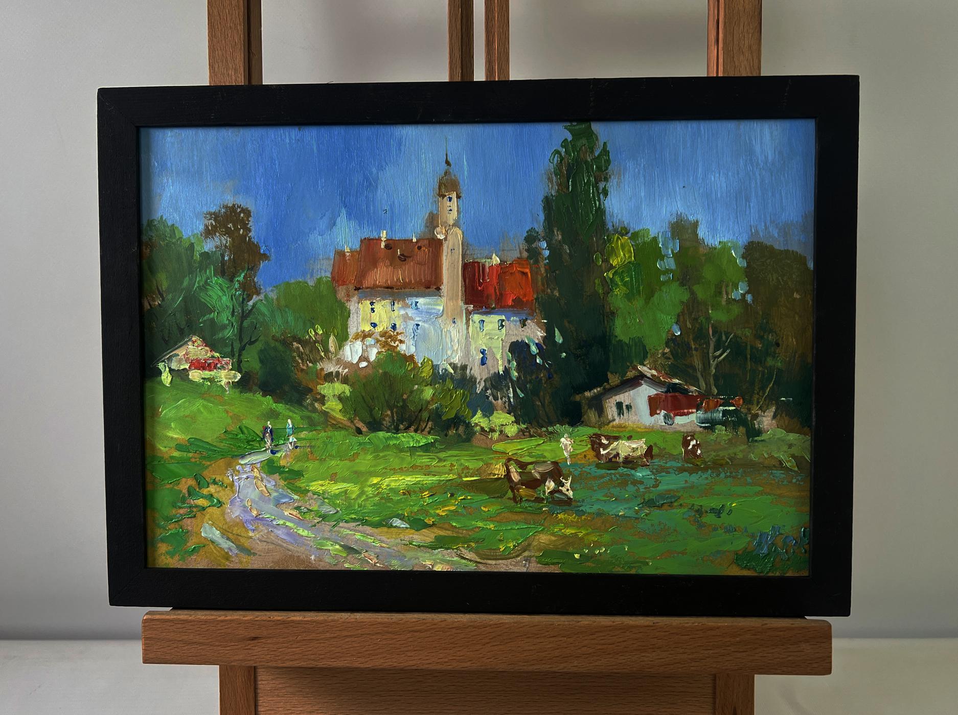 Framed oil painting by Yuriy Suprunchuk of castle over steppe with village scene