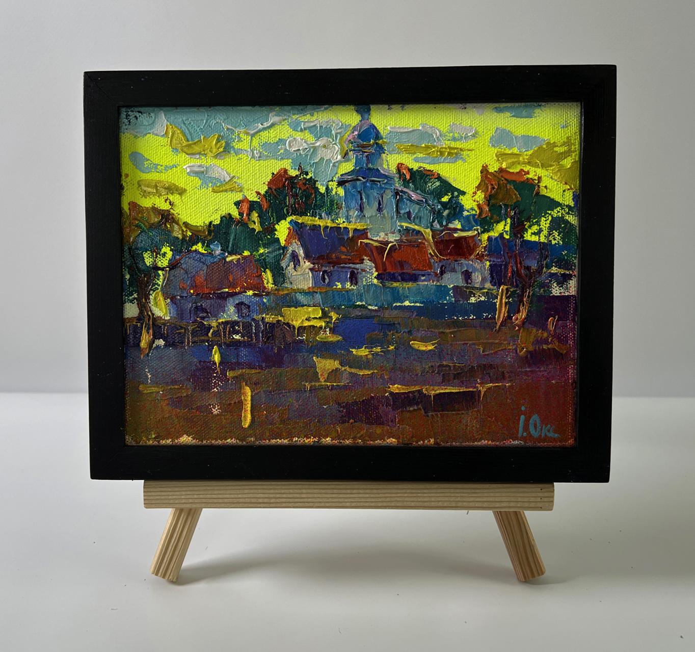 Vibrant impressionist oil painting by Oksana Ivanyuk of sunlit morning village in black frame