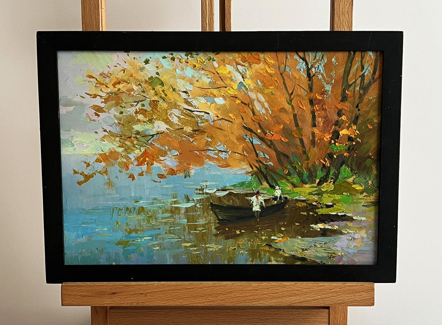 Oil painting On the autumn river by Yuriy Suprunchuk in black frame