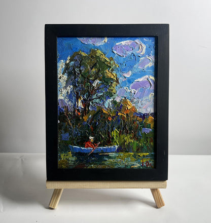 Oil painting Early morning on a boat by Oleksiy Ivanyuk in black frame