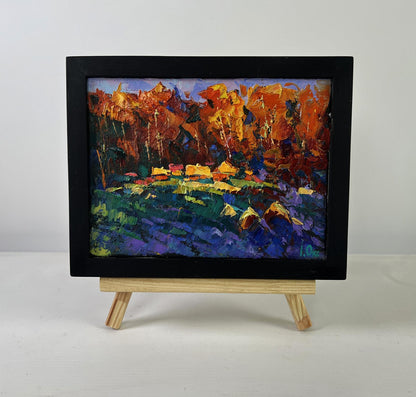 Vibrant oil painting Fires ignite darkness and silence by Oksana Ivanyuk in black frame
