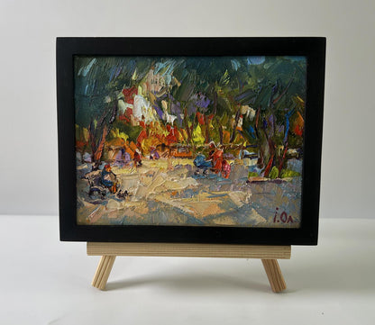 Vibrant impressionist oil painting On a walk in the park by Oleksiy Ivanyuk in black frame