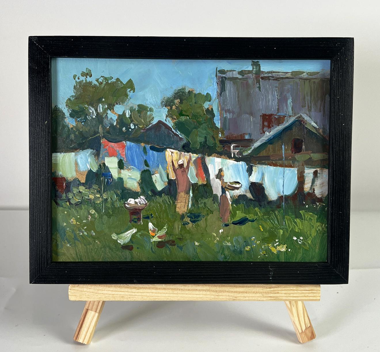 Oil painting Daytime rural life by Yuriy Suprunchuk vibrant laundry scene