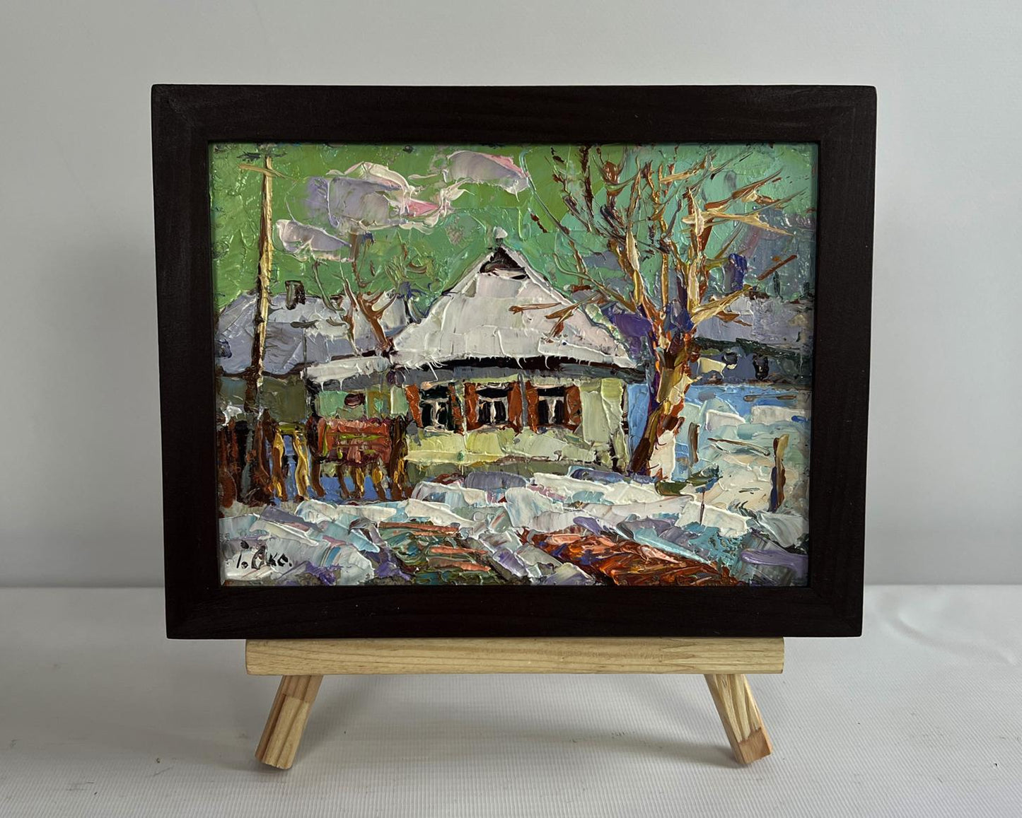 Oil painting Saturday winter day by Oksana Ivanyuk snowy village scene