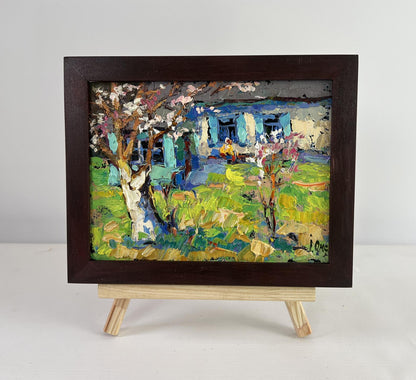 Oil painting Silence and sun in the yard by Oksana Ivanyuk in dark frame