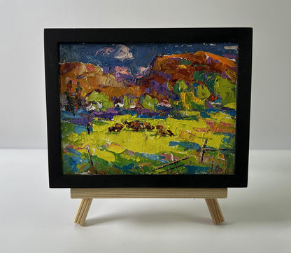 Oil painting Meadows near the mountains by Oleksiy Ivanyuk in black frame
