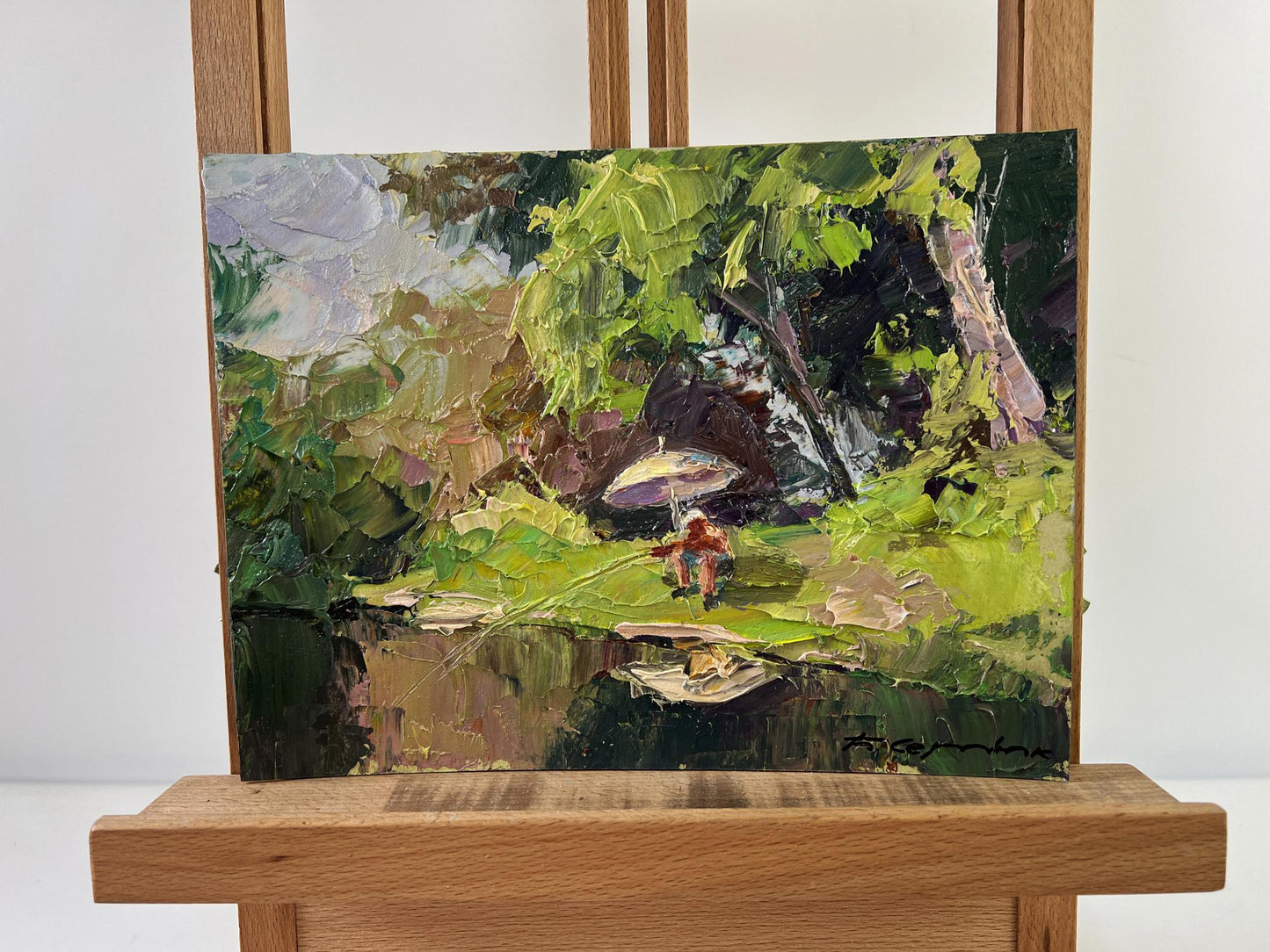 Vibrant impressionist oil painting by Boris Serdyuk: lush foliage, figure with umbrella