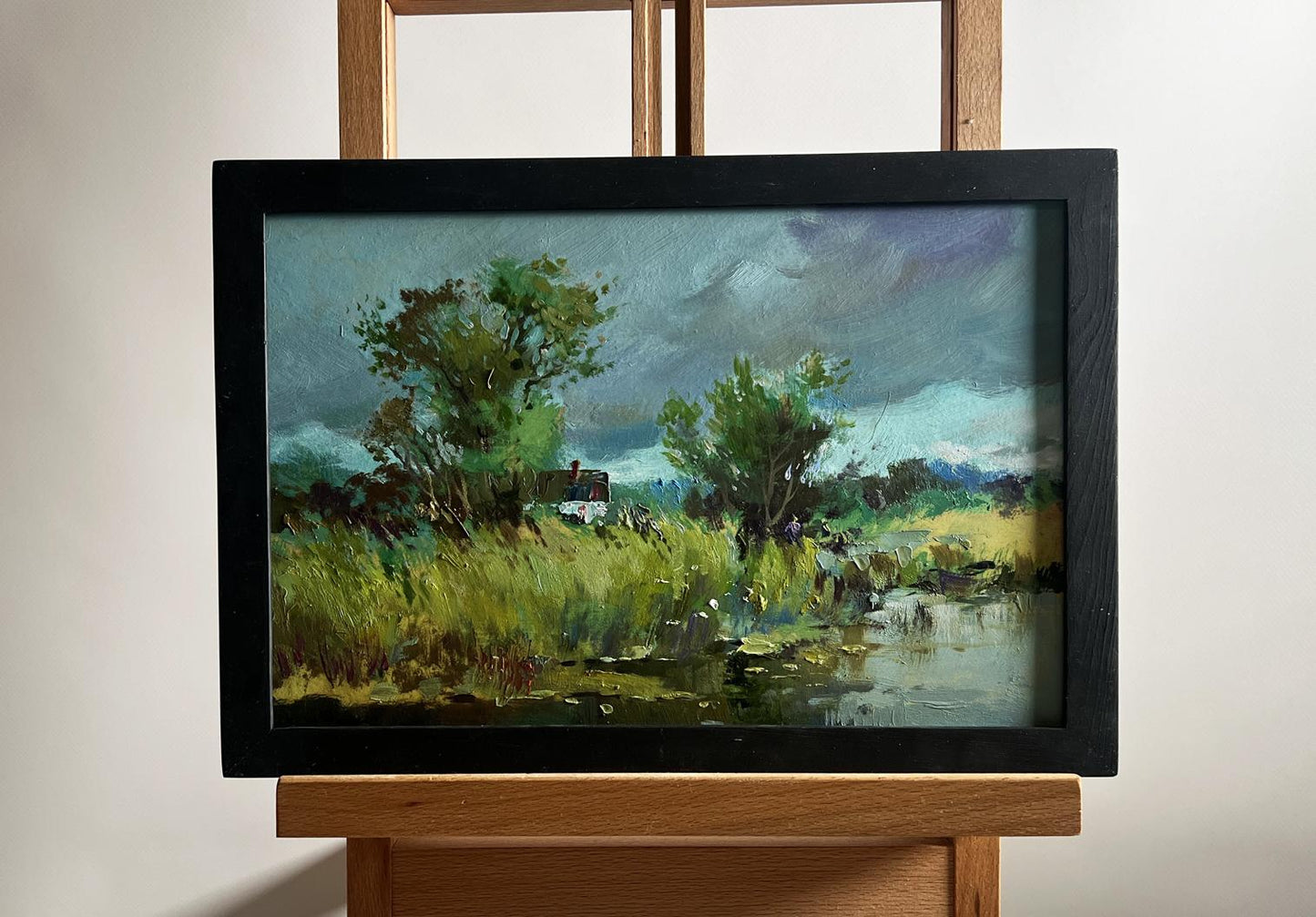 Oil painting On the outskirts of the village by Yuriy Suprunchuk, serene landscape