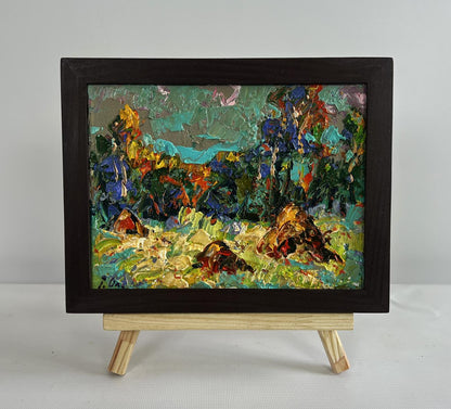 Oil painting Haystacks in the field by Oleksiy Ivanyuk in wooden frame