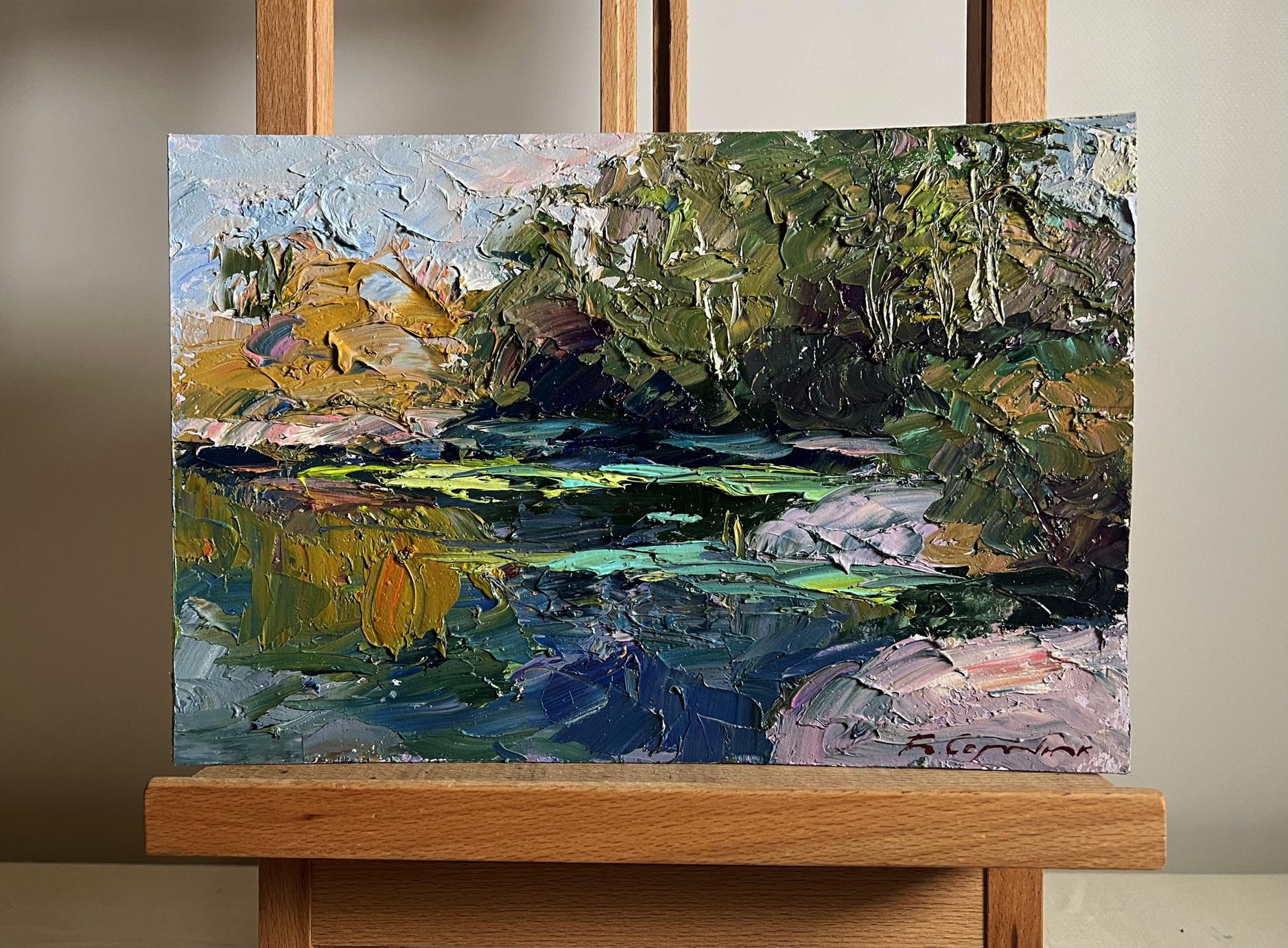 Oil painting Relaxation on the Lake by Boris Serdyuk, lush green foliage and blue water