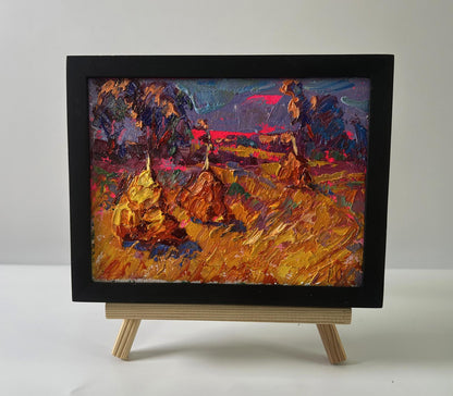 Oil painting Sunset over the field by Oleksiy Ivanyuk in black frame