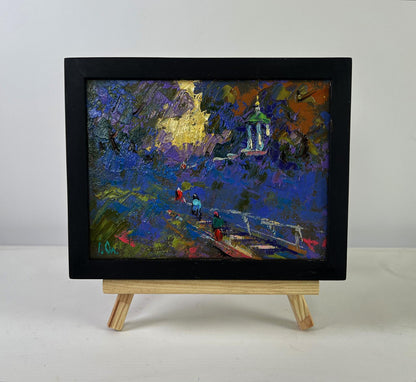 Oil painting Warm moments among loved ones by Oleksiy Ivanyuk in black frame