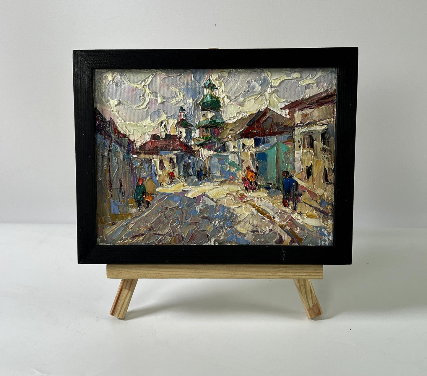 Oil painting Morning city by Oleksiy Ivanyuk, cobblestone street scene in black frame