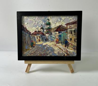 Oil painting Morning city by Oleksiy Ivanyuk, cobblestone street scene in black frame