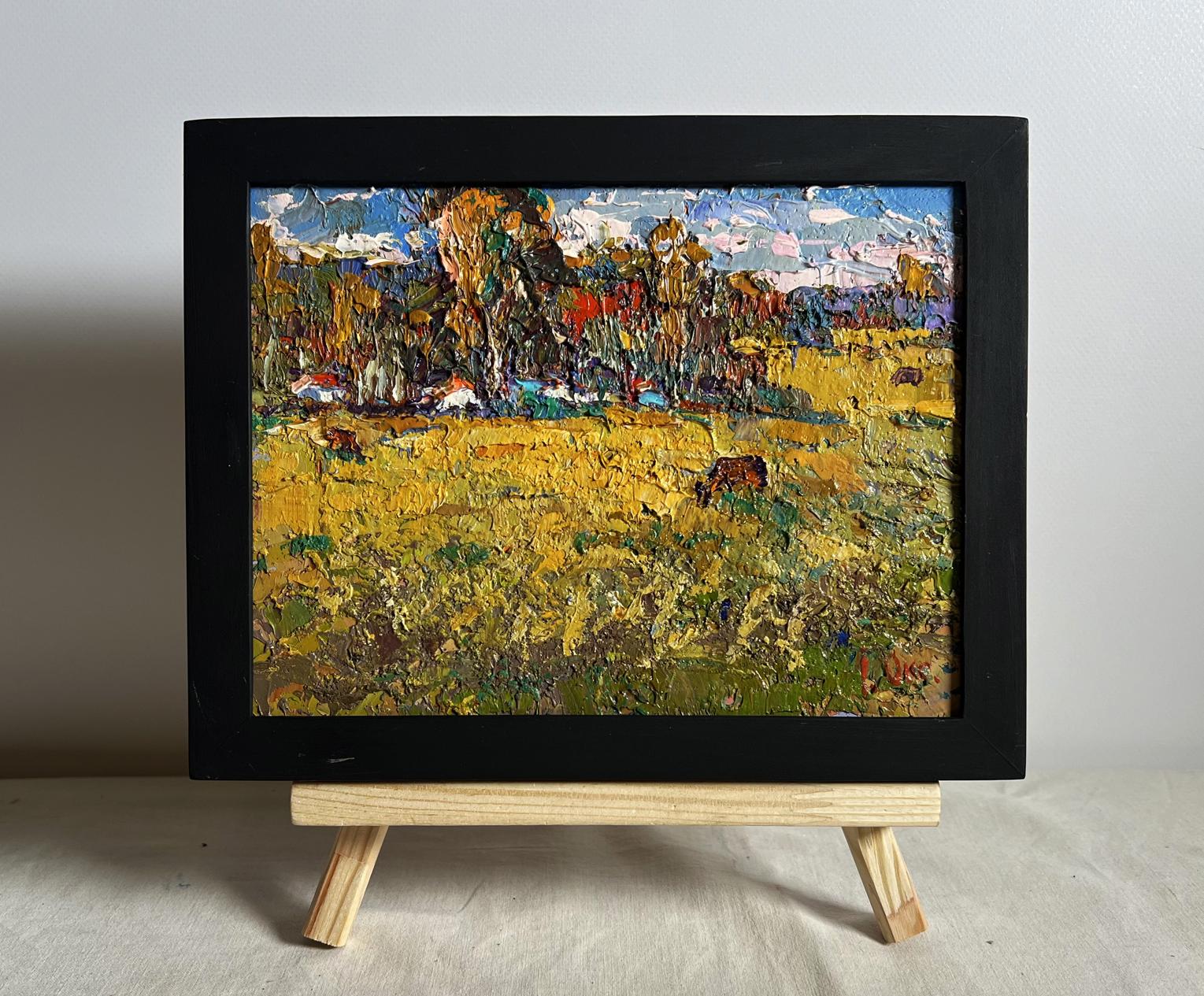 Oil painting of yellow autumn meadows by Oksana Ivanyuk in black frame