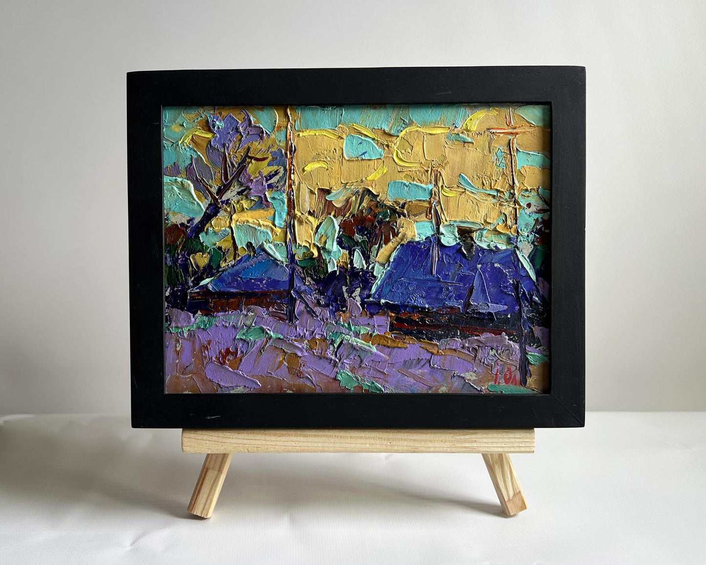 Oil painting Cold evening in the village by Oleksiy Ivanyuk in black frame