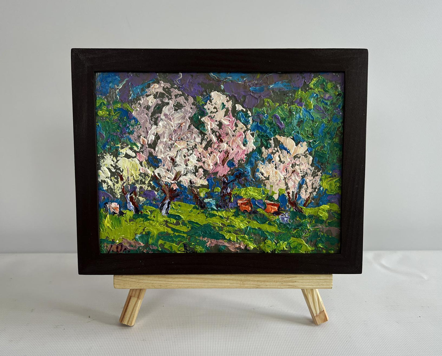Framed Spring Blossom oil painting by Oleksiy Ivanyuk with pink trees
