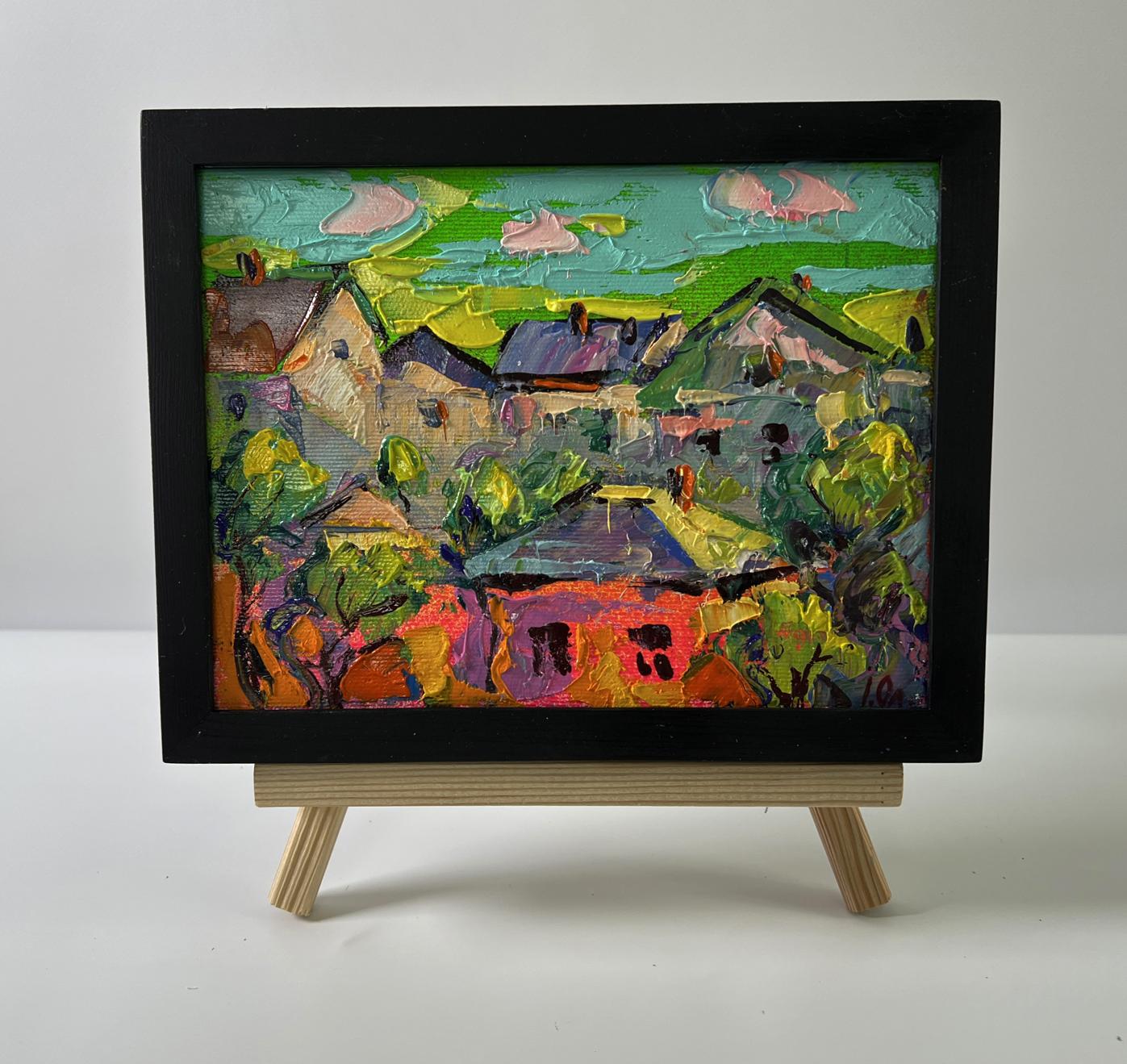 Vibrant oil painting of colorful village houses by Oleksiy Ivanyuk in black frame